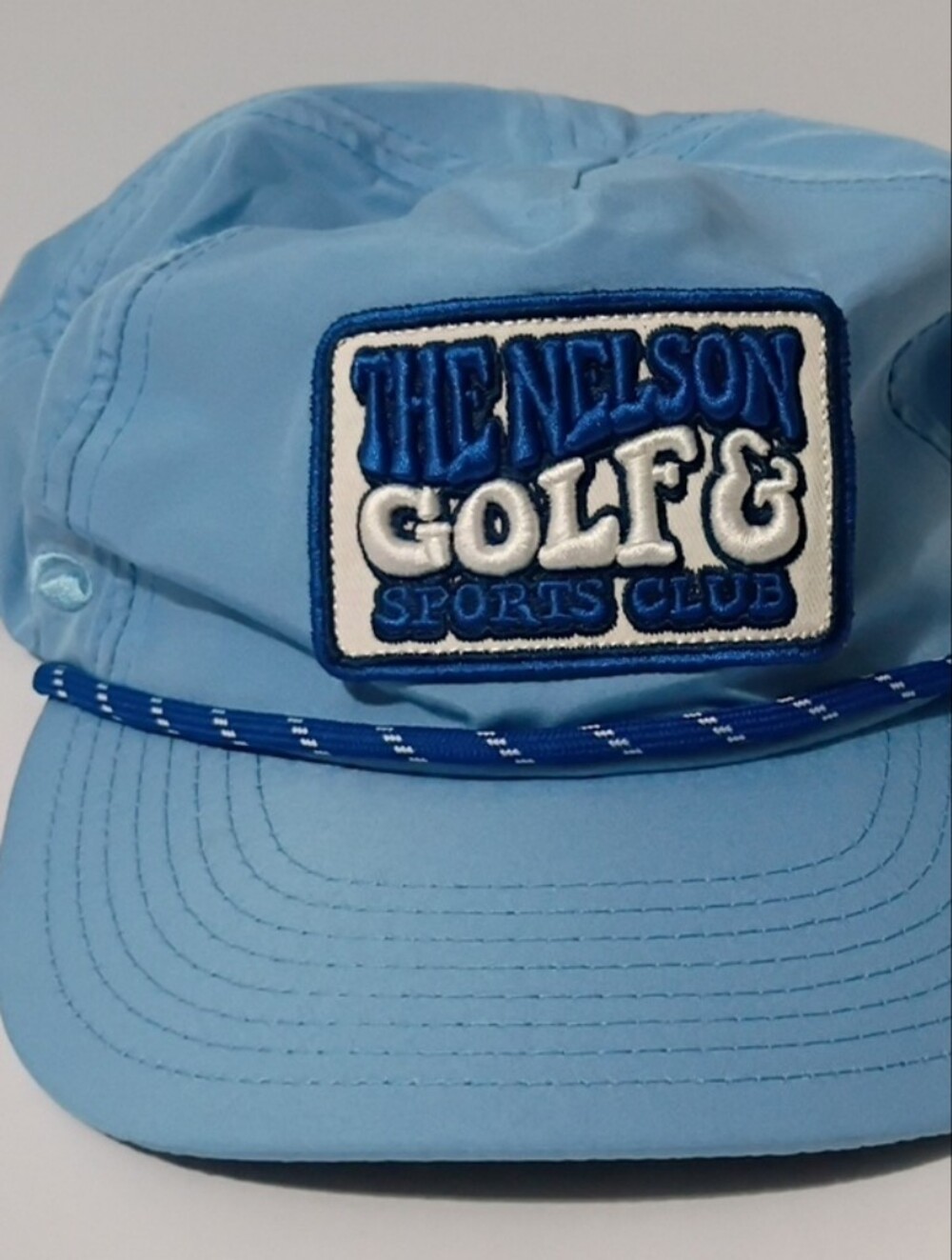 The Nelson Golf Club Light Blue Rope-Trim Cap